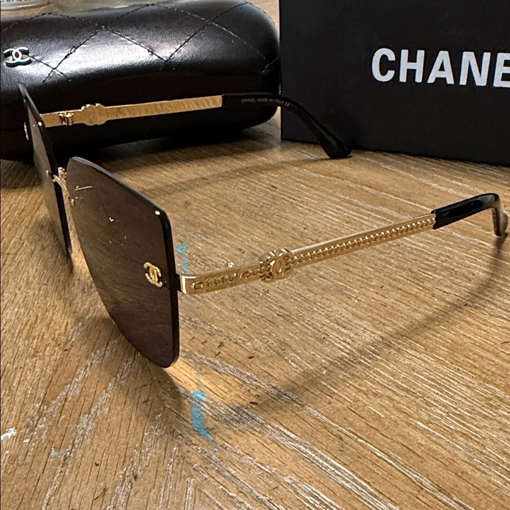 CHANEL Black Rimless Square Sunglasses with Gold Accents - Picture 4 of 9